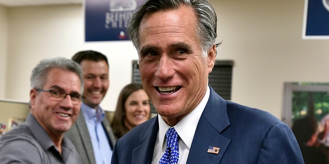Republican Utah Senate candidate Mitt Romney greets supporters who gathered to await election results in Orem, Utah, on Nov. 6. (AP Photo/Gene Sweeney Jr.)