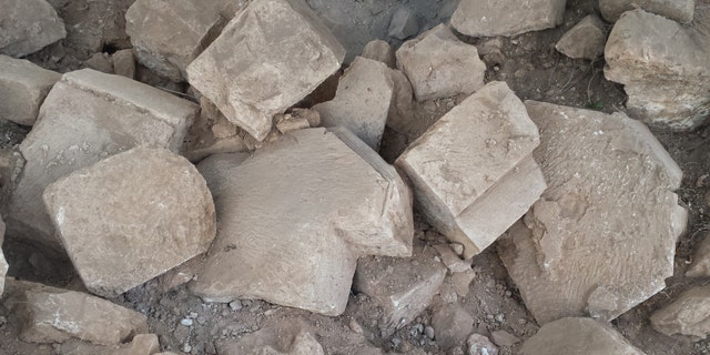 Fallen masonry blocks at Montfort Castle.