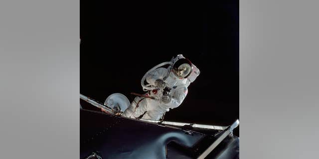 Astronaut Russell Schweickart performs a spacewalk on the fourth day of the Apollo 9 mission (NASA).