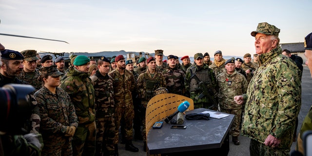 U.S. Admiral James G. Foggo, right, Commander of the NATO Trident Juncture exercise, speaks during a ceremony at Vaernes airport in Stjordal, Wednesday Nov. 7, 2018, marking the end of the NATO exercise Trident Juncture.