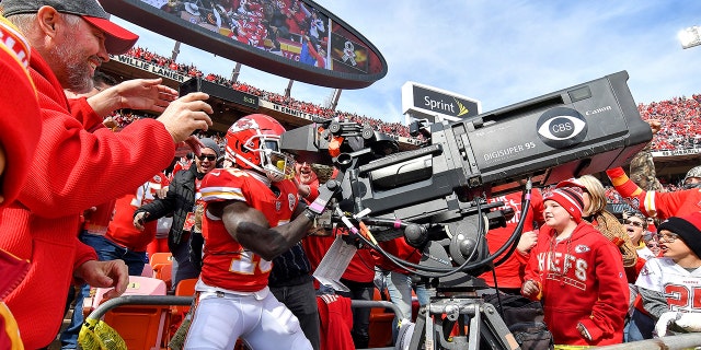 Kansas City Chiefs wide receiver Tyreek Hill takes control of the end zone television camera after scoring a touchdown on a pass from quarterback Patrick Mahomes in the second quarter of an NFL football game against the Arizona Cardinals Sunday, Nov. 11, 2018 at Arrowhead Stadium in Kansas City, Mo.