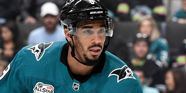 Evander Kane #9 of the San Jose Sharks looks down the ice against the New York Islanders at SAP Center on October 20, 2018 in San Jose, California.