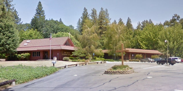The wooden cross at Our Savior Lutheran Church in Paradise, California still stands after the building and the surrounding area burned down.
