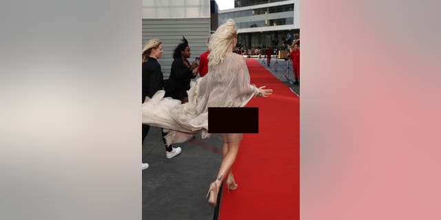 Rita Ora suffered a wardrobe malfunction while attending Cartier’s Precious Garage party on Thursday.