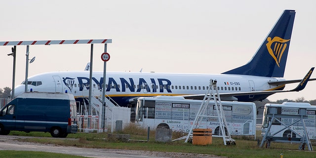 A Ryanair plane sits on the tarmac at the Bordeaux-Merignac airport in southwestern France on Friday after being impounded by French authorities.