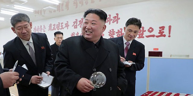 Kim Jong Un visits glass factory once suspected of producing military ...