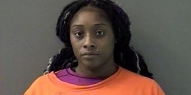 The Texas woman allegedly placed the dog's body in a dumpster following the alleged beating.