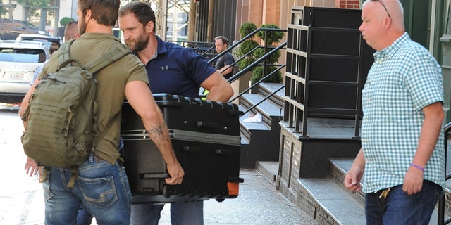 Taylor Swift being transported in a huge suitcase from her Tribeca apartment into her truck, in the trunk. A fleet of cars including two large cadillacs and three suv's arrive at Tailor Swift's apartment in Tribecca to move a large suitcase from apartment to truck. Almost a dozen of Taylor Swift security guards were present to move this package carefully as Taylor Swift remains to be unseen for a long time. Pictured: Taylor Swift Ref: SPL1539678 170717 NON-EXCLUSIVE Picture by: SplashNews.com Splash News and Pictures Los Angeles: 310-821-2666 New York: 212-619-2666 London: 0207 644 7656 Milan: 02 4399 8577 photodesk@splashnews.com World Rights