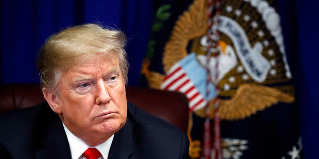 President Donald Trump listens during a roundtable discussion on the First Step Act, Monday, Nov. 26, 2018, in Gulfport, Miss. (AP Photo/Alex Brandon)