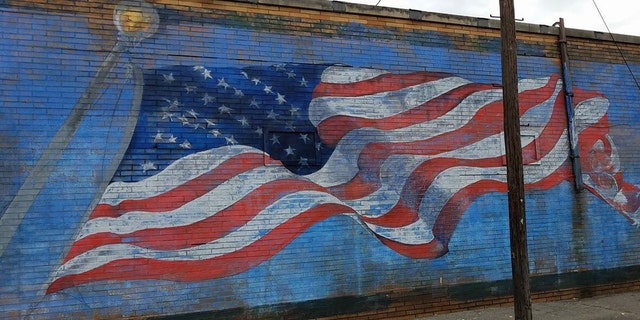 The American flag mural on the side of La Bella Pizza Bistro in New Paltz, NY before it was vandalized Monday night.