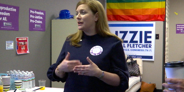 Democrat Lizzie Fletcher, who's looking to unseat Rep. John Culberson, speaks to volunteers at a campaign event in Houston.