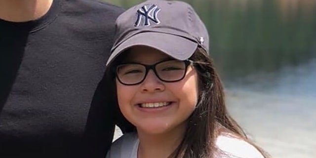 Angie Erives, 11, was fatally shot while seated in the kitchen of her family's North Las Vegas home Thursday night when shooters intent on gang-related retaliation targeted the wrong house, police said.