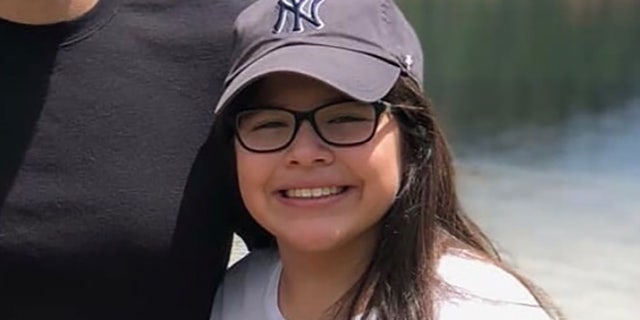 Angie Erives, 11, was fatally shot while seated in the kitchen of her family's North Las Vegas home Thursday night when shooters intent on gang-related retaliation targeted the wrong house, police said.