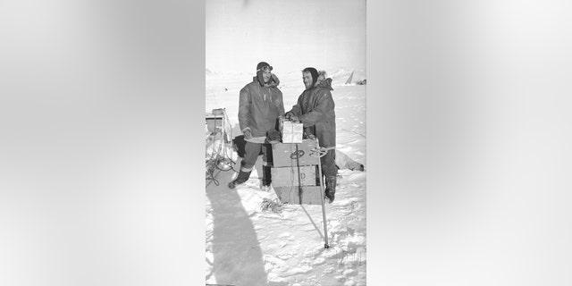 The end of the first sledge journey from Hope Bay: Victor Russell and David James. Launched in 1943, Operation Tabarin was an expedition to secretly establish bases, keep a watchful eye on German and Japanese activities, and curb opportunistic Argentinian incursions. (Credit: Natural Environment Research Council)
