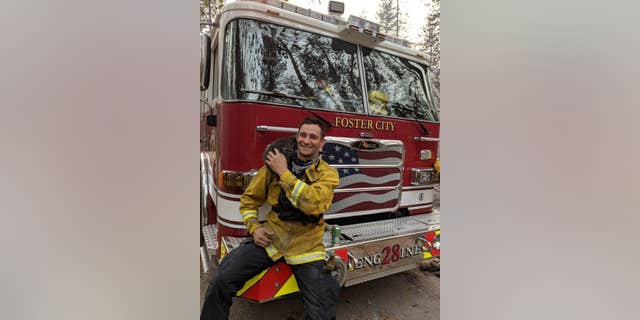 "Foster" the cat was coaxed out of hiding by Firefighter Downing, and "an instant friendship was formed.<br data-cke-eol="1">