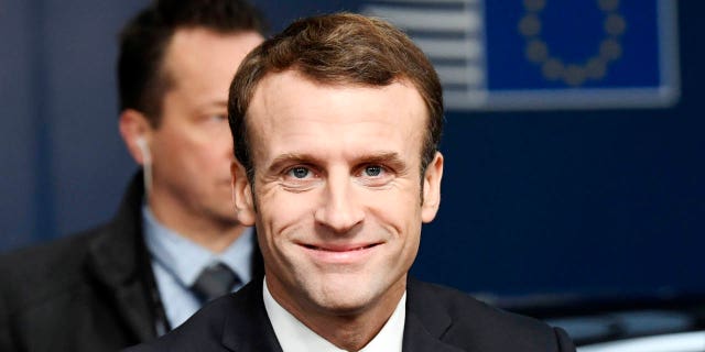 French President Emmanuel Macron arrives for an EU summit at the Europa building in Brussels, Sunday, Nov. 25, 2018.