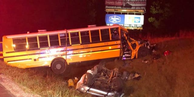 One person died, and 11 others were injured Tuesday night when a truck collided with a school bus full of kids on an interstate in Alabama.