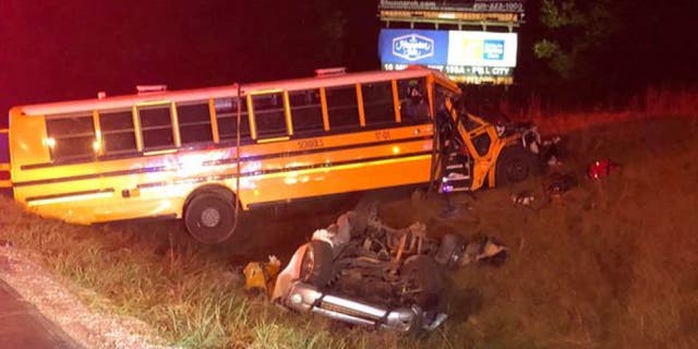 One person died, and 11 others were injured Tuesday night when a truck collided with a school bus full of kids on an interstate in Alabama.