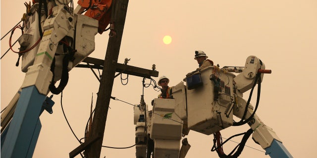 An energized power line and insulator appeared to have separated from one of the metal towers near the area where the Camp Fire broke out, the company told regulators on Tuesday.