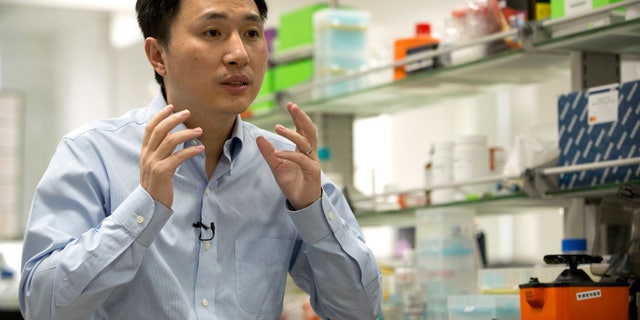 In this Oct. 10, 2018 photo, He Jiankui speaks during an interview at a laboratory in Shenzhen in southern China's Guangdong province. Chinese scientist He claims he helped make world's first genetically edited babies: twin girls whose DNA he said he altered. He revealed it Monday, Nov. 26, in Hong Kong to one of the organizers of an international conference on gene editing. (AP Photo/Mark Schiefelbein)