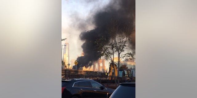 The fire halted the morning commute on the Brooklyn Bridge on Wednesday, Nov. 21, 2018.