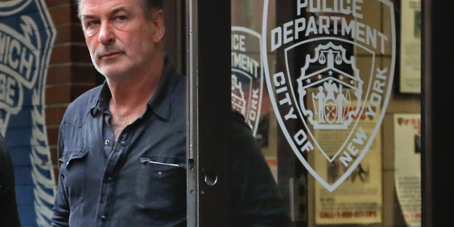 Actor Alec Baldwin walks out of the New York Police Department's 10th Precinct, Friday, Nov. 2, 2018, in New York. Baldwin was arrested Friday after allegedly punching a man in the face during a dispute over a parking spot outside his New York City home, authorities said.(Photo/Julie Jacobson)