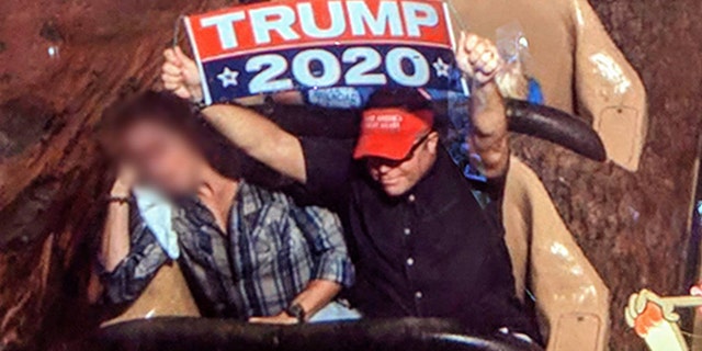 A man has been banned from Disney World for the second time after violating the rule that prohibits guest from displaying signs or banners at the park.
