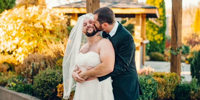 Horton slipped into a spare wedding dress and donned a delicate chiffon veil, then tapped the groom on his shoulder as friends tried to stifle their giggles