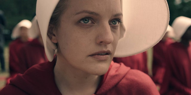 Elisabeth Moss stars as Offred in Hulu's "The Handmaid's Tale" based on Margaret Atwood's book.