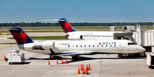 The FBI has announced that the woman who managed to board a Delta Air Lines flight from at Orlando International Aiport without an ID or boarding pass last weekend will not be charged “at this time” for her actions.