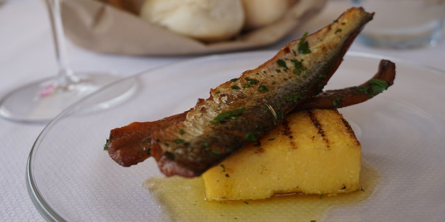 Monte Isola is famous for its local culinary traditions that include sardina, a preserved fish often served griddled and on a bed of polenta.
