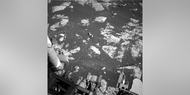An image taken by the Curiosity rover of the 18th hole it has drilled on Mars.