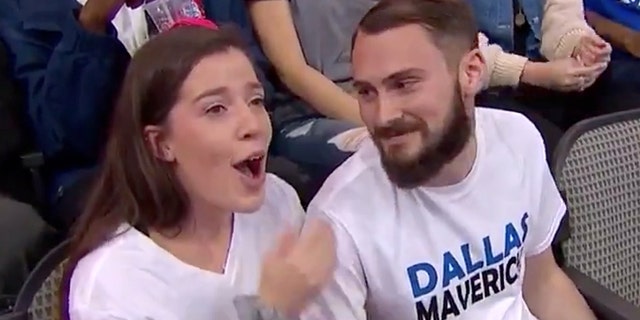 Cameras then zoomed in on Green’s face, broadcasting her reaction and subsequent “yes” on the jumbotron.