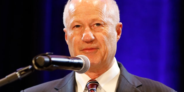 United States Rep. Mike Coffman, R-Colo., 6th District, delivers his concession speech during an election night party in Lone Tree, Colo., Tuesday, Nov. 6, 2018. (AP Photo/Jack Dempsey)