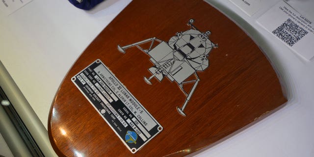 A spacecraft ID plate from the Apollo lunar module "Eagle" led the sale of the Armstrong Family Auction with a sale price of $468,500 at Heritage Auctions in Dallas on Nov. 1, 2018.