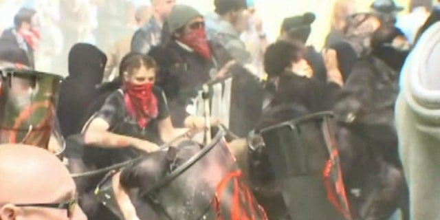 Groups clash during a protest in Portland Ore.