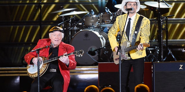 Roy Clark and Brad Paisley perform onstage at the 50th annual CMA Awards at the Bridgestone Arena on November 2, 2016 in Nashville, Tennessee.