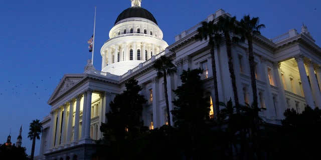 The lights of the Capitol dome shine as lawmakers work into the night Friday, Aug. 31, 2018, in Sacramento, Calif. Friday is the final day for California lawmakers to consider bills before they adjourn until after the November elections. (AP Photo/Rich Pedroncelli)