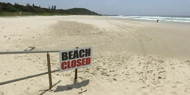 This Nov. 7, 2018, image made from video shows the beach where a shark attack occurred in Ballina, Australia.