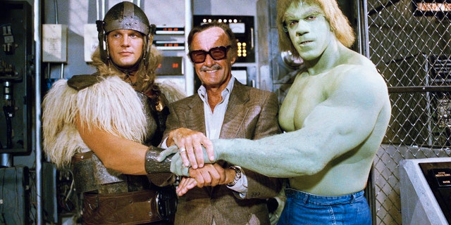 FILE - In this May 9, 1988, file photo, comics impresario Stan Lee, center, poses with Lou Ferrigno, right, and Eric Kramer who portray 'The Incredible Hulk' and Thor, respectively, in a special movie for NBC, 'The Incredible Hulk Returns,' May 9, 1988, Los Angeles, Calif.