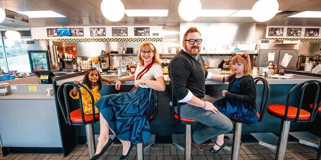 The Nichols family honored their love of the breakfast chain with a Christmas photo shoot.