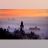 The castle of Kronberg stands in the fog that covers the city of Frankfurt, Germany, November 14, 2018.