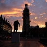 The sun rises as seen in Parliament Square with the statue of former Prime Minister Winston Churchill in the foreground in London, November 14, 2018.  