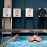 Sarah Salem swims as voters cast their ballots at Echo Deep Pool in Los Angeles, November 6, 2018. 