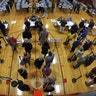 Voters wait in line in the gymnasium at Brunswick Junior High School to receive their ballots for the mid-term election, in Brunswick, Maine, November 6, 2018. 