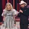 Hosts Carrie Underwood, wearing a bubble wrap dress, and Brad Paisley appear at the 52nd annual CMA Awards at Bridgestone Arena in Nashville, November 14, 2018.