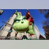 The Grinch balloon floats down Central Park West during the Macy's Thanksgiving Day Parade in New York City, Nov. 22, 2018.