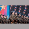Russian soldiers dressed in Red Army World War II uniforms march during a parade in Red Square, in Moscow, November 7, 2018. 