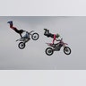 Riders perform during a freestyle motocross show at the EICMA exhibition motorcycle fair in Milan, Italy, November 8, 2018. 