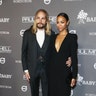 Actress Zoe Saldana and husband Marco Perego keep close at the 2018 Baby2Baby Gala presented by Paul Mitchell at 3LABS on November 10, 2018 in Culver City, Calif.